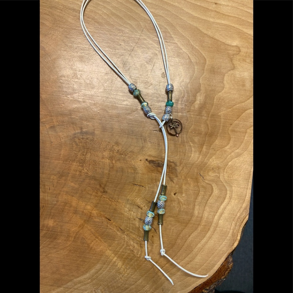Handmade bolo with soft pearl cord.  Czech Glass, Brass and French beads.